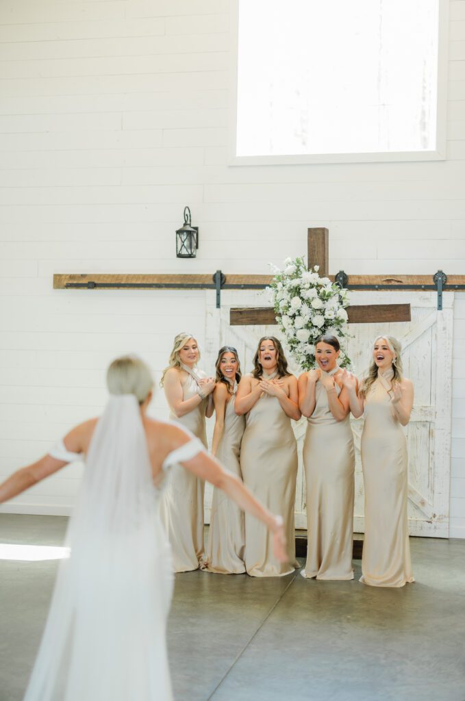 4T Vineyards wedding bridesmaid first look in Alabama with bride
