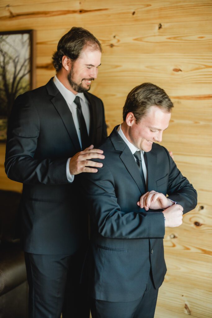 4T Vineyards wedding getting ready in Alabama with groom and best man