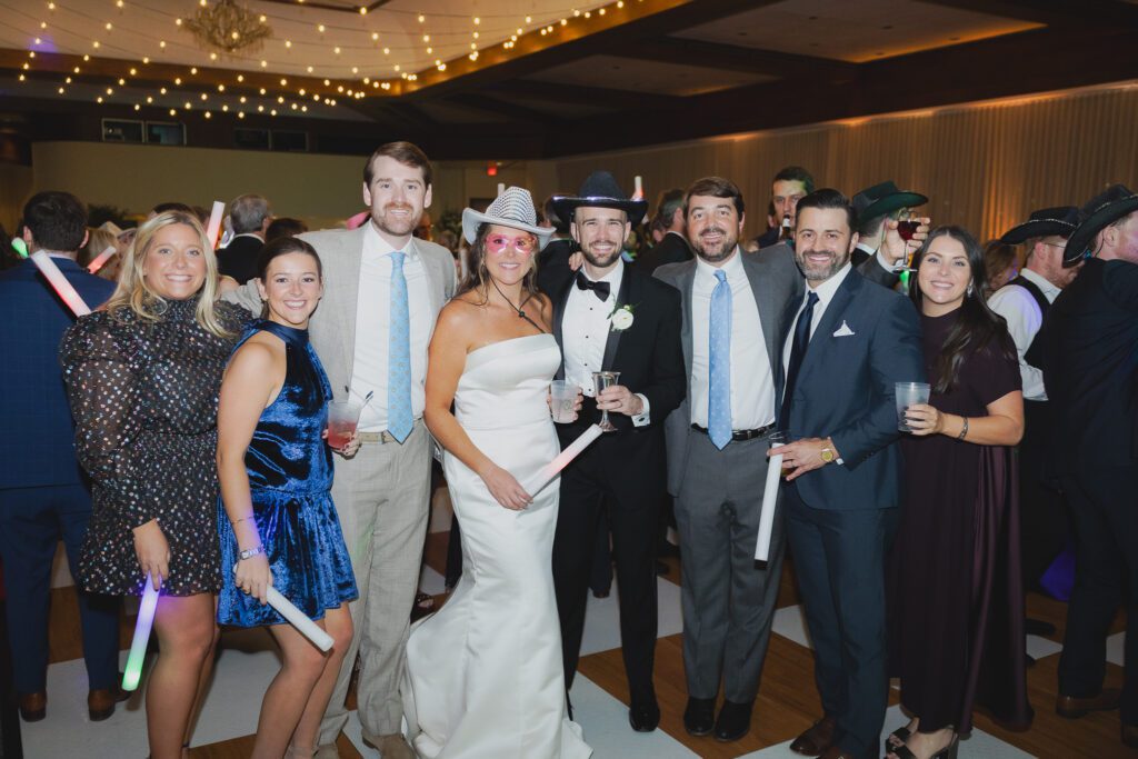 Guests dancing at a Birmingham Alabama wedding reception with lively celebration