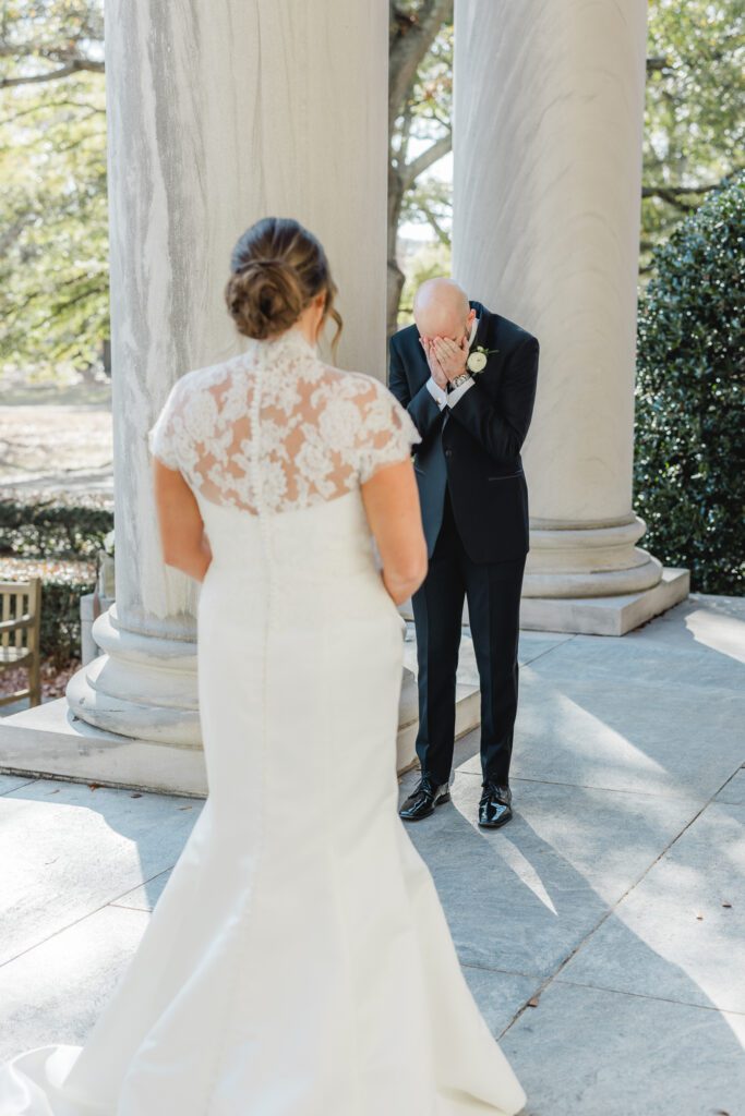 Groom’s emotional reaction during first look captured by a Birmingham wedding photographer