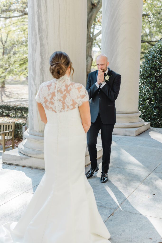 Groom’s emotional reaction during first look captured by a Birmingham wedding photographer