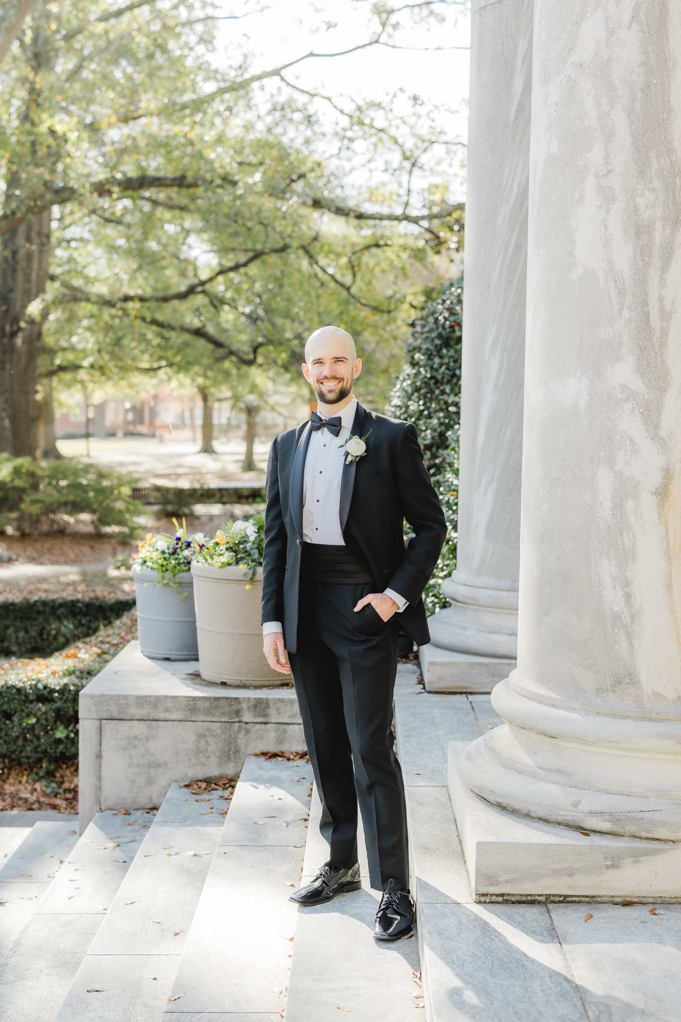 Groom portrait with suit from Mr. Burch's before ceremony at Reid Chapel in Birmingham Alabama