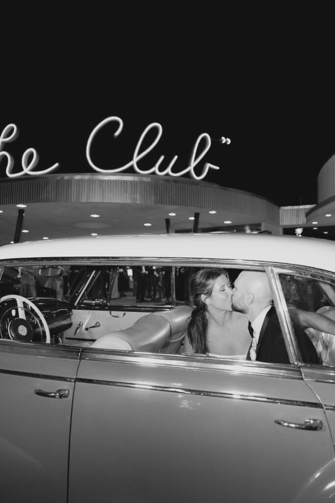 Bride and groom leave out at The Club Birmingham wedding reception