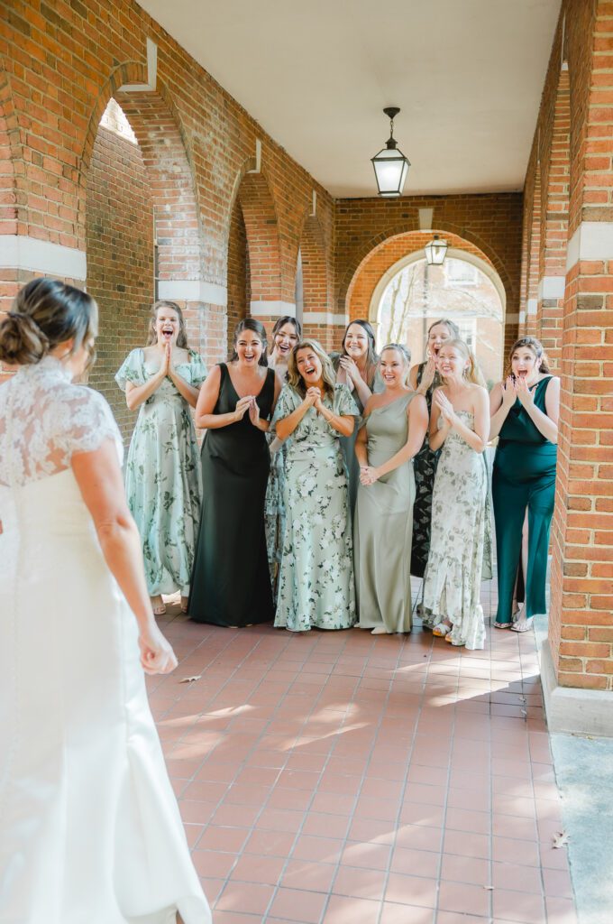 Bride and bridesmaids first look with a romantic garden party wedding style in Birmingham Alabama