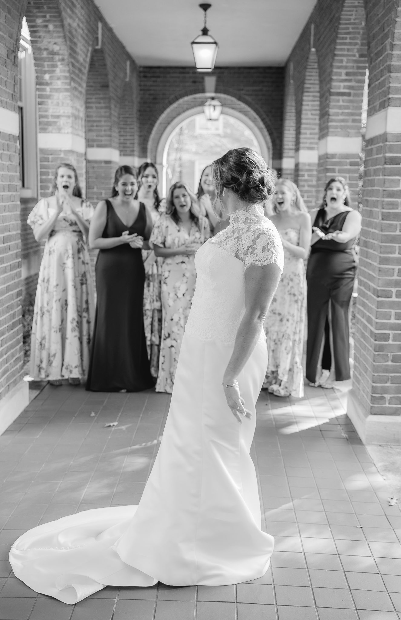 Bride and bridesmaids first look with a romantic garden party wedding style in Birmingham Alabama