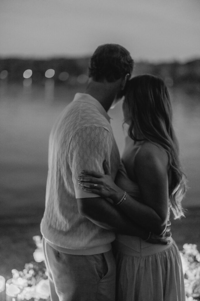 candlelit lakeside proposal scene at night at Smith Lake Alabama