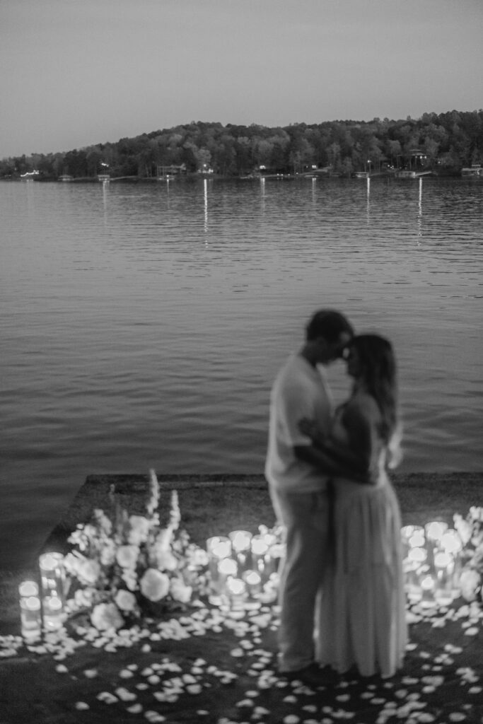 candlelit lakeside proposal scene at night at Smith Lake Alabama
