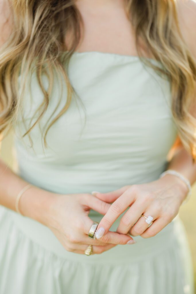 close up of engagement ring during proposal at Smith Lake Alabama