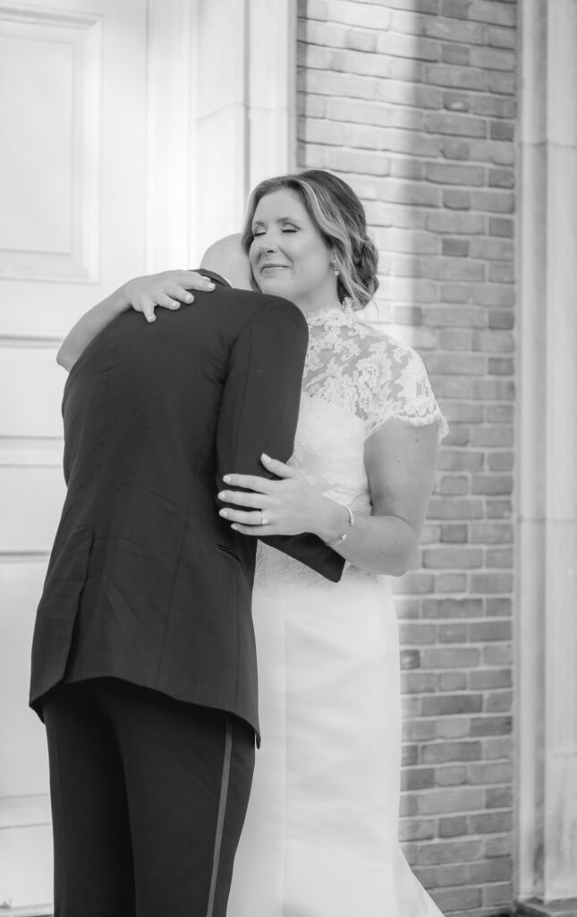 Bride and groom sharing an emotional first look before their Birmingham Alabama wedding ceremony