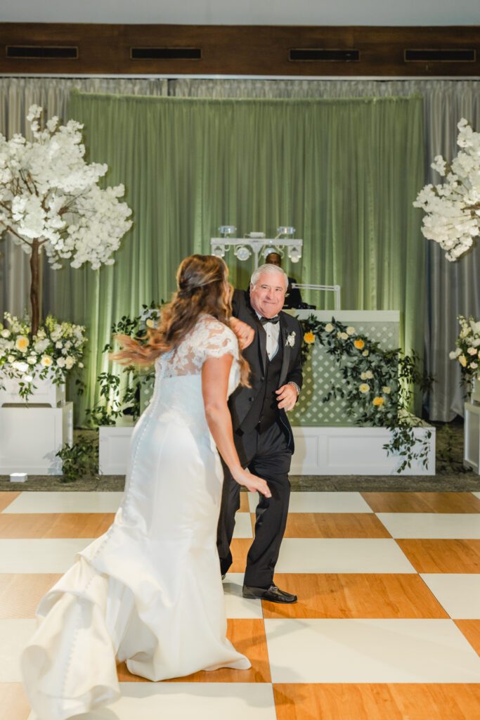 Bride and father sharing their first dance at The Club Birmingham wedding reception
