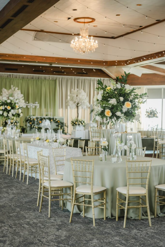 Elegant wedding reception at The Club in Birmingham Alabama with candlelight and floral design