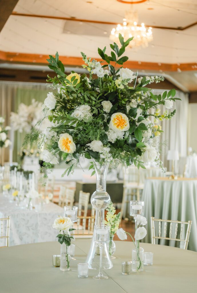 Elegant wedding reception at The Club in Birmingham Alabama with candlelight and floral design