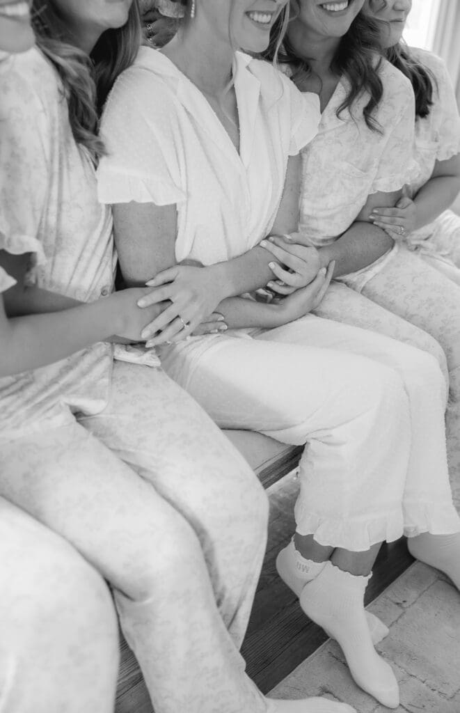 Emotional bridesmaids with bride at Camelot Manor