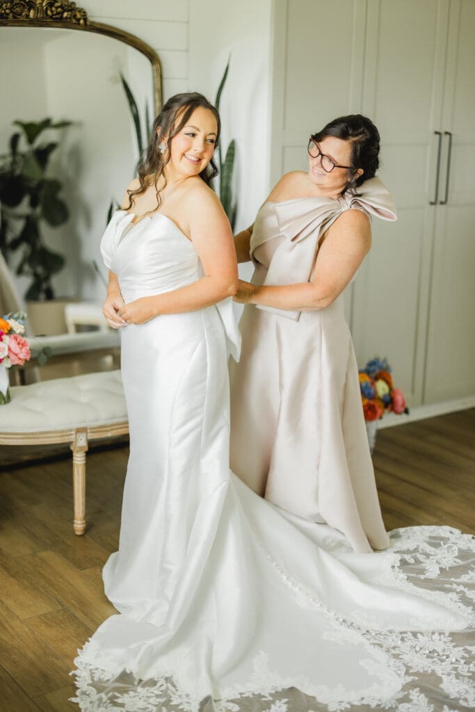 Bride getting ready with mother before Hoyt Hollow wedding ceremony