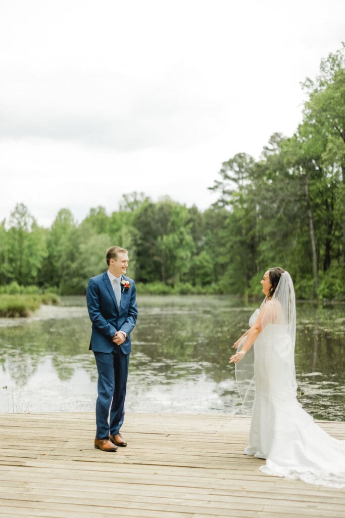 Emotional first look between bride and groom at Hoyt Hollow wedding