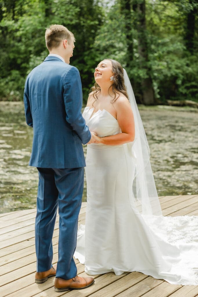 Emotional first look between bride and groom at Hoyt Hollow wedding