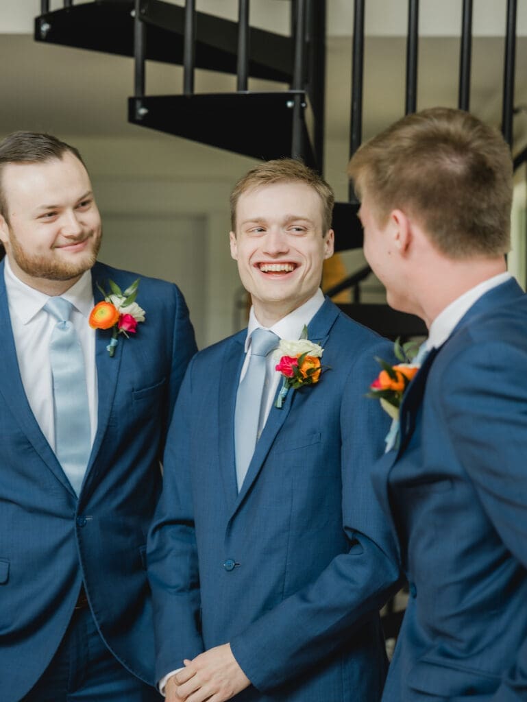 Groom getting ready with brothers before Hoyt Hollow wedding ceremony