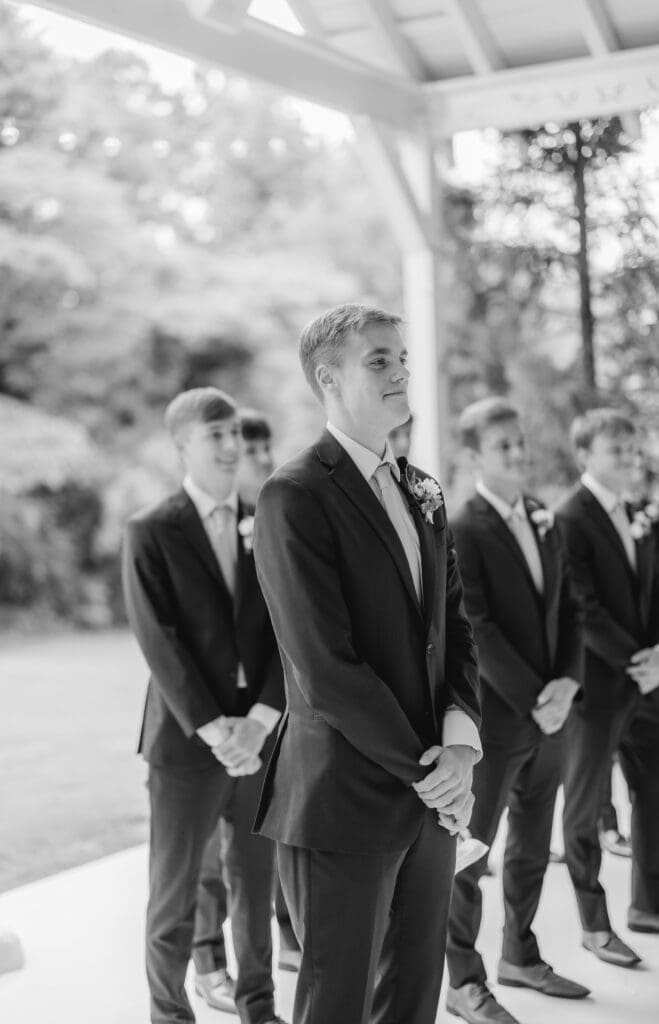 Groom happy as bride walks down aisle