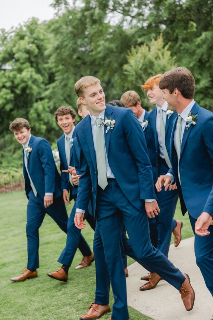 Groom and groomsmen portraits at Camelot Manor wedding venue