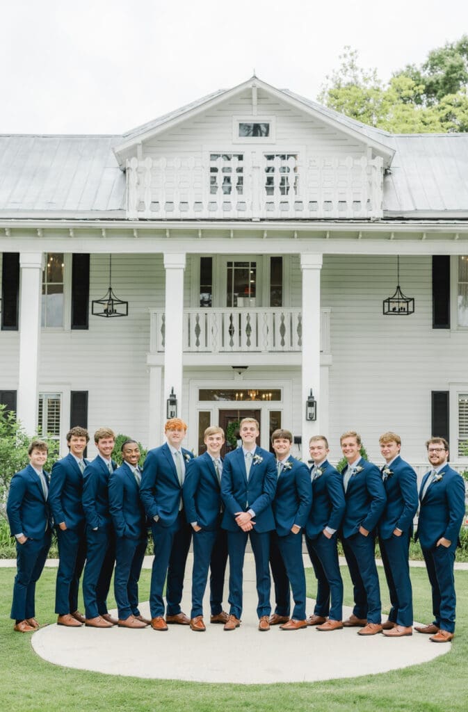 Groom and groomsmen portraits at Camelot Manor wedding venue