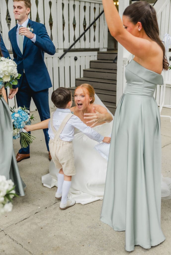 Bride and groom emotional recessional after wedding ceremony