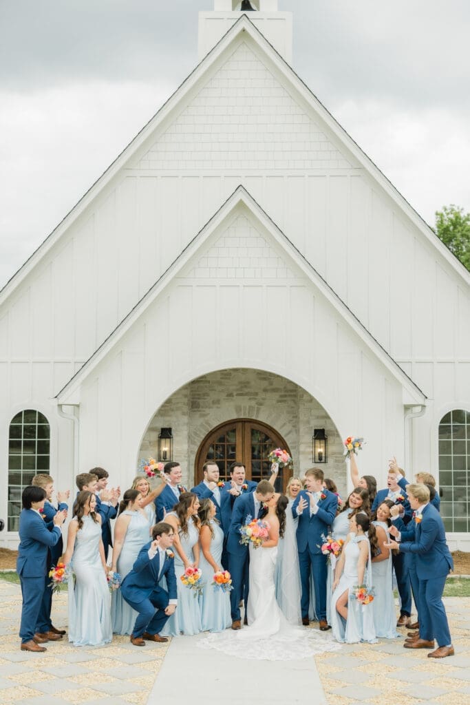 Bridal party with colorful florals at Hoyt Hollow wedding in Alabama
