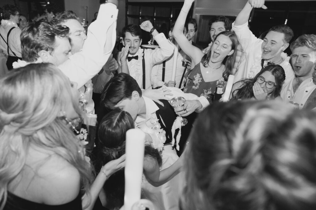 Candid moments captured during a joyful Ridge Pointe wedding reception.