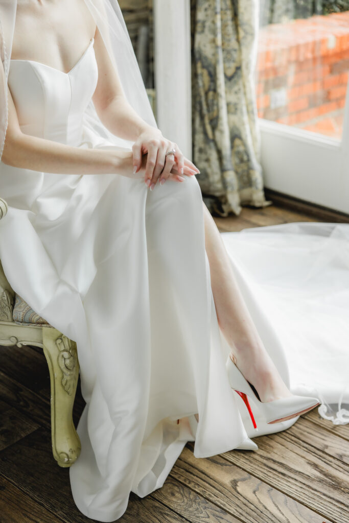 Christian Louboutin bridal shoes photographed during a luxury Ridge Pointe wedding near Birmingham.