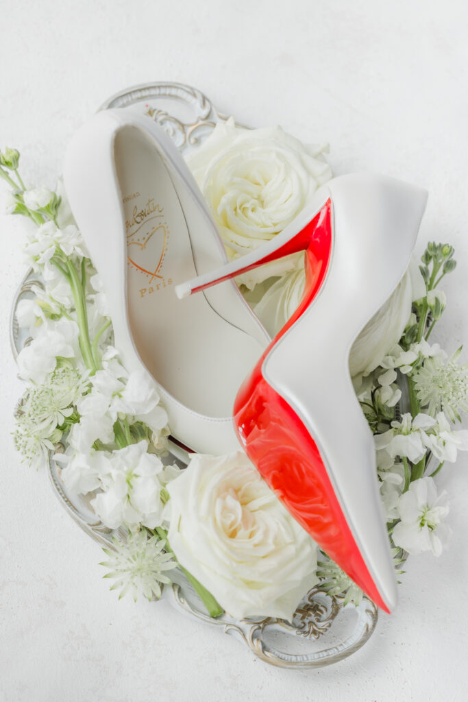 Christian Louboutin bridal shoes photographed during a luxury Ridge Pointe wedding near Birmingham.