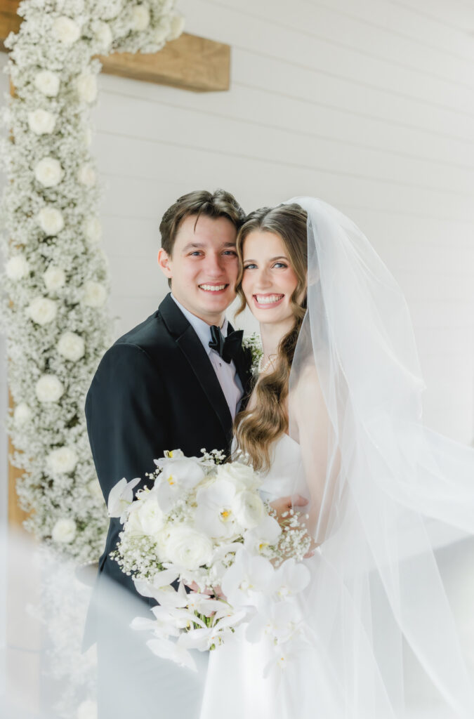 Classic bride and groom portraits captured at Ridge Pointe wedding venue in Alabama.