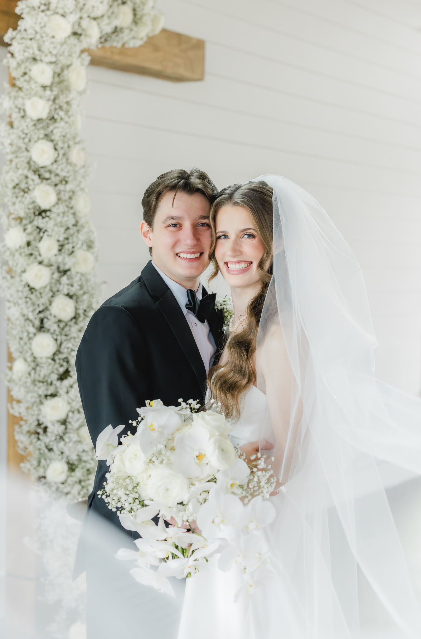 Classic bride and groom portraits captured at Ridge Pointe wedding venue in Alabama.