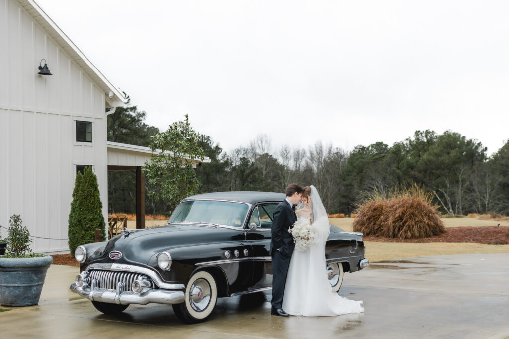 Couple portrait with classic car at Ridge Pointe