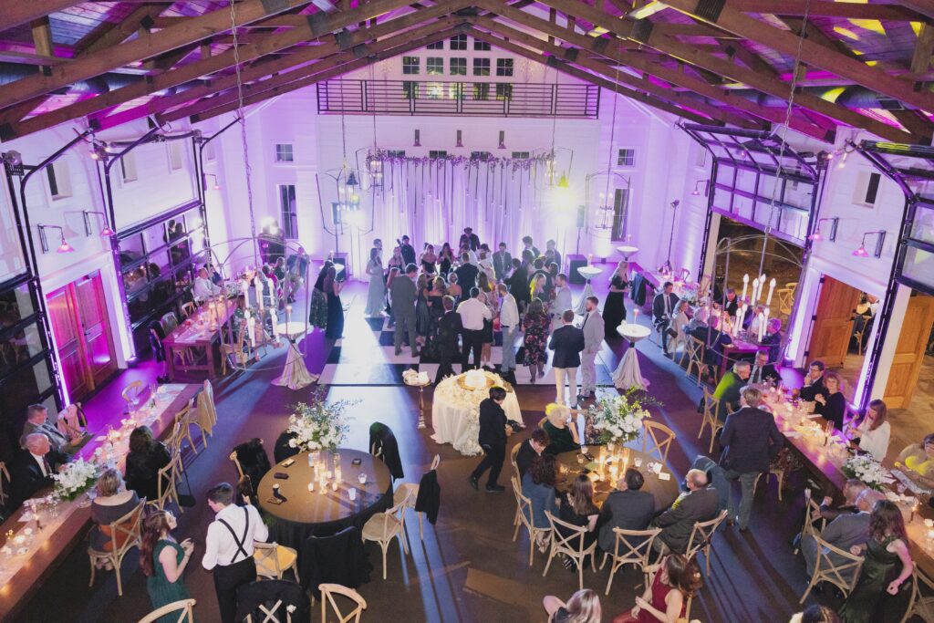 Guests filling the dance floor during a fun Ridge Pointe wedding reception.