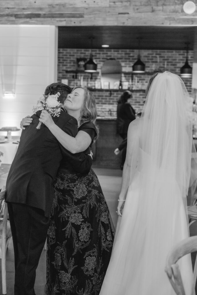 Newly married couple celebrating after their Ridge Pointe wedding ceremony.