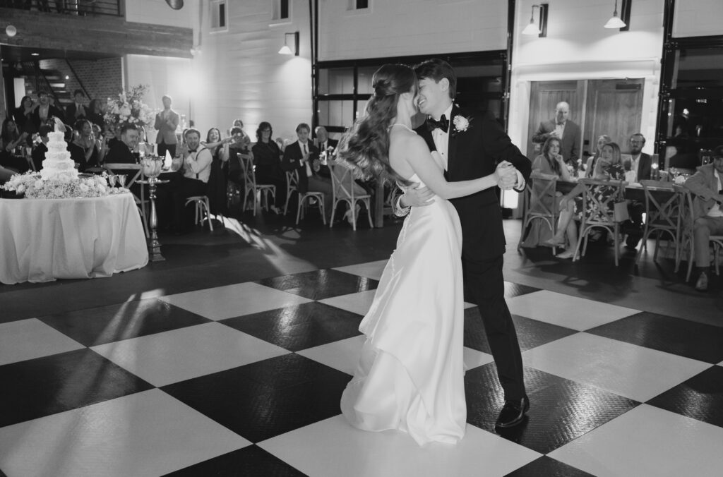Bride and groom sharing their first dance during their Ridge Pointe wedding reception.