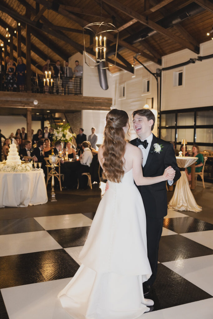 Bride and groom sharing their first dance during their Ridge Pointe wedding reception.
