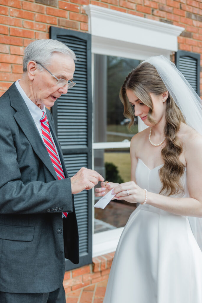 Emotional reactions during a first look with grandfather photographed by Birmingham wedding photographers.