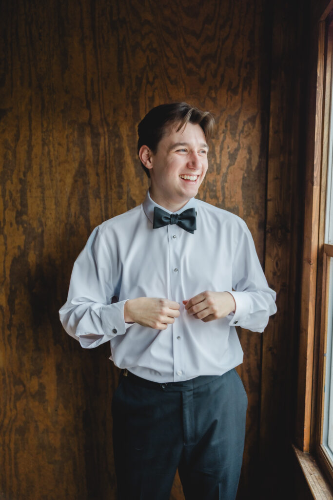 Groom getting ready before a Ridge Pointe wedding near Birmingham.
