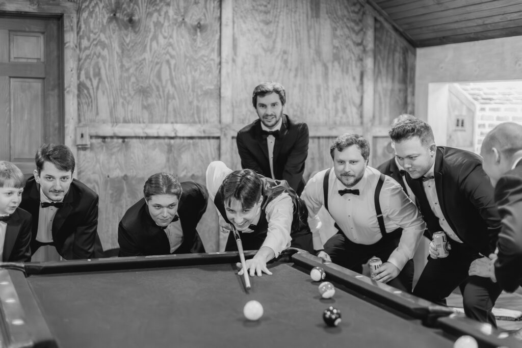 Groom getting ready with his groomsmen before a Ridge Pointe wedding near Birmingham.