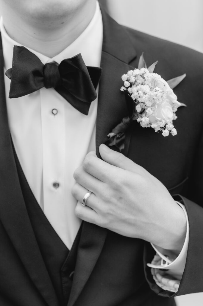 Portrait of the groom before his luxury January wedding at Ridge Pointe.