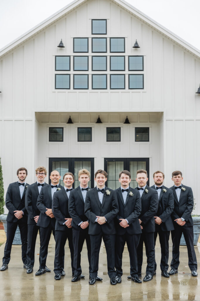 Groom and groomsmen portraits at Ridge Pointe wedding venue.