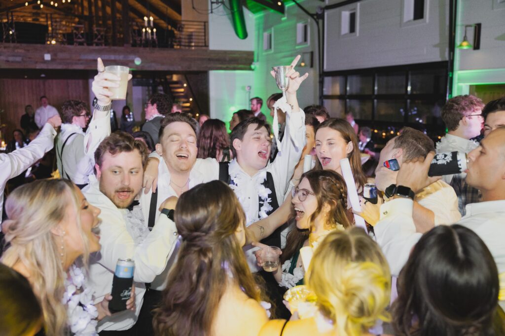 Candid moments captured during a joyful Ridge Pointe wedding reception.