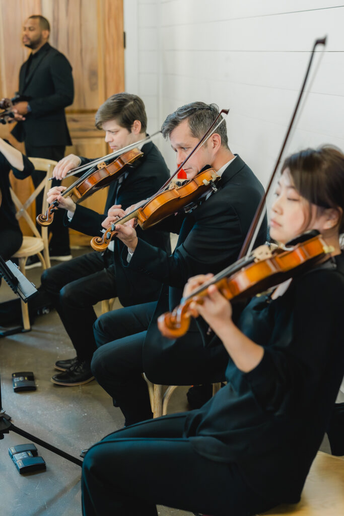 Wedding ceremony violins at Ridge Pointe.