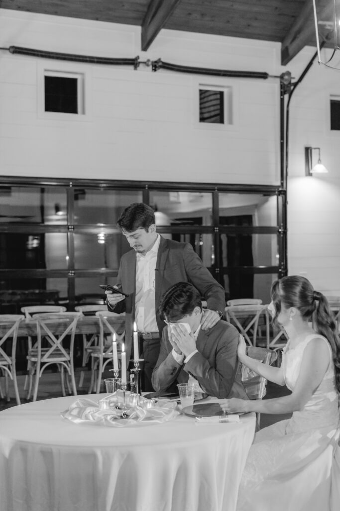 Emotional speeches during a wedding rehearsal dinner captured by Birmingham wedding photographers.