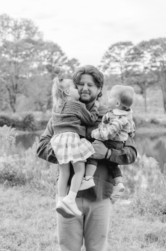 Family photographed outdoors during a Birmingham Alabama fall photography session