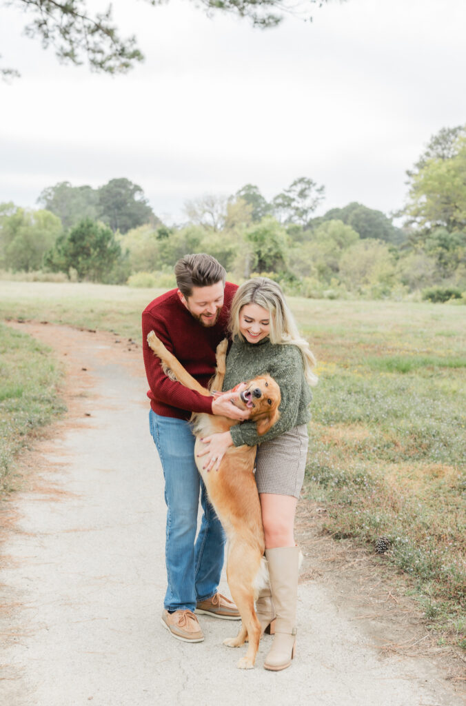 Family posing for fall family photos during a Birmingham mini session