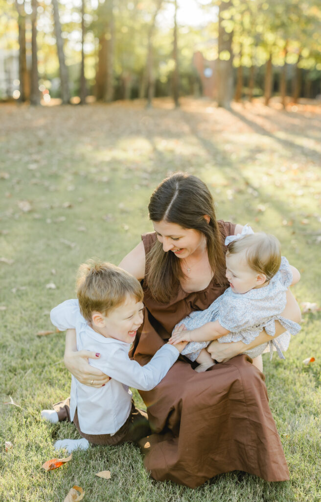 Birmingham family photographer capturing candid moments during an Alabama fall mini session
