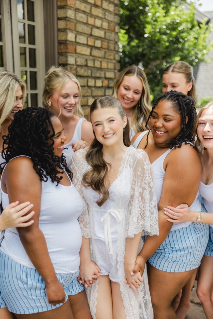 Kendall and her bridesmaids together at Clubhouse on Highland before the wedding ceremony
