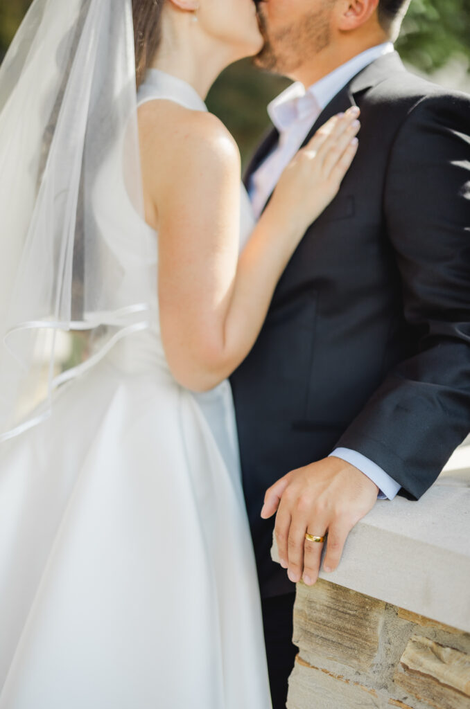 Elegant wedding portrait of Kendall and Luke outside the chapel at Church of the Highlands