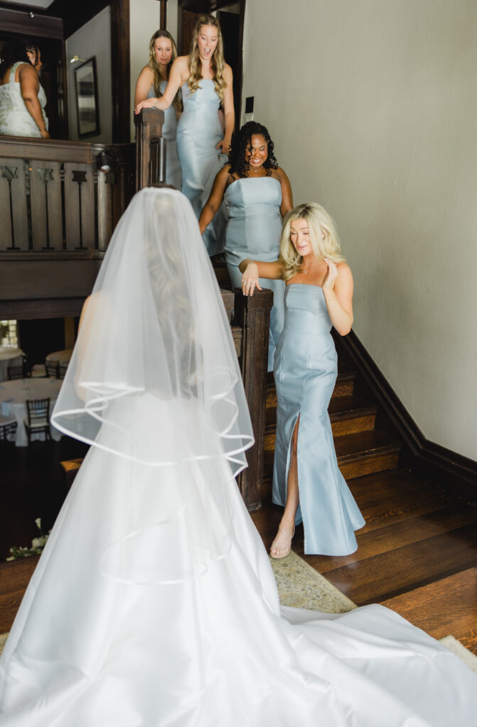 Kendall’s bridesmaids reacting emotionally as they see her in her wedding dress for the first time